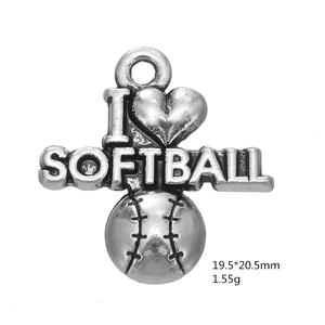 Macro view of silver-tone alloy softball heart pendant with I SOFTBALL text and stitching