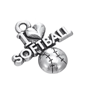 Macro shot of silver alloy softball charm featuring I Love Softball text and heart engraving