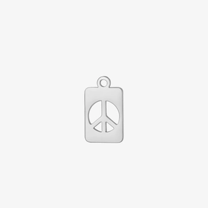 Macro shot of silver stainless steel rectangular peace sign pendant with cutout detail