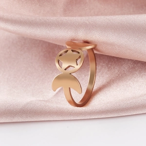Polished rose gold stainless steel ring with hollow star and crescent moon designs