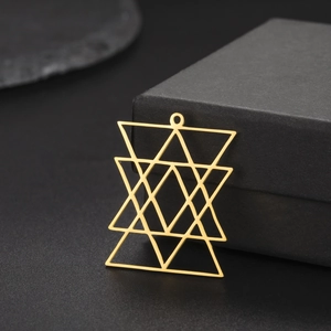 Geometric interlocking triangle gold pendant on a premium black textured jewelry box