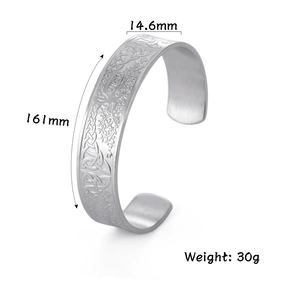 Detail view of Celtic knot engraved cuff bracelet showing width 14.6mm and 161mm length