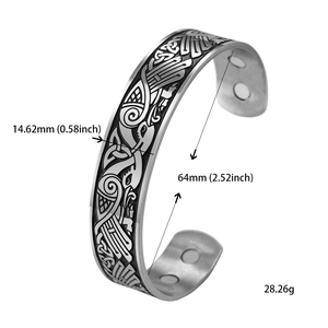 Detail showing titanium steel cuff bangle dimensions with dual bird patterns and magnetic inlay