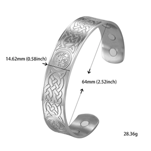 Vintage magnetic stainless steel open bangle with Celtic knot patterns and triple heart design