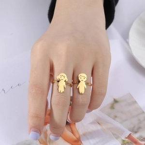 Minimalist gold plated stainless steel rings featuring cute boy and girl silhouettes