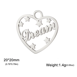 Detail view of heart-shaped steel charm with Dream engraving, 20x20mm size and 1.4g weight