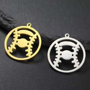 Set of gold and silver hollow stainless steel baseball pendants on a dark stone base