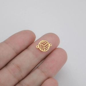 Detailed view of a gold hollow volleyball pendant with dual rings for DIY jewelry making