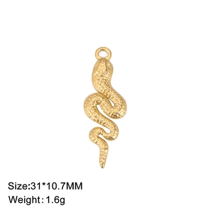 Macro shot of 31x10.7mm golden stainless steel snake pendant with fine scale texture