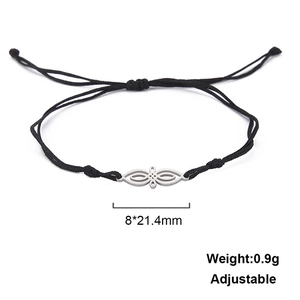Detailed view of adjustable black braided cord bracelet with 8x21.4mm stainless steel charm