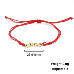 Adjustable red braided rope bracelet with three gold paw print charms, 23.9x8mm size