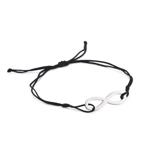 Detail of adjustable black cord bracelet featuring a polished silver infinity symbol charm