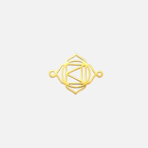 Detailed view of golden stainless steel chakra connector with hollow geometric patterns