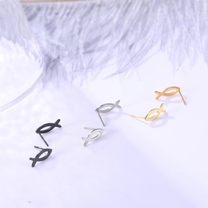 Detailed view of minimalist fish-shaped hollow stud earrings in gold, silver, and black