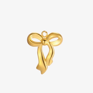 Polished gold stainless steel bow pendant with a smooth finish and top ring for DIY jewelry