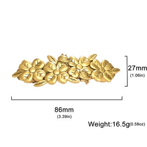 Golden flower hair clip detail with dimensions of 86mm length and 27mm height