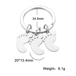 Polished stainless steel keychain featuring cute footprints pendants with detailed size specs