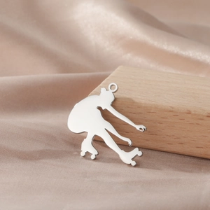 Polished silver roller skater pendant detail on champagne silk for DIY jewelry making