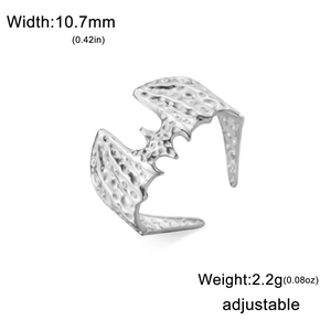 Detailed view of silver bat wing ring showing 10.7mm width and adjustable band features