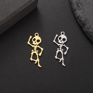 Skeleton charm set in gold and silver finish made of 18K gold plated stainless steel