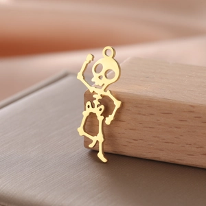 Macro detail of 18K gold-plated stainless steel hollow skeleton pendant for jewelry DIY
