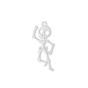 Macro shot of silver-toned hollow skeleton charm with polished stainless steel finish