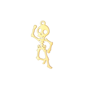 Macro detail of a hollow 18K gold-plated dancing skeleton pendant with smooth edges
