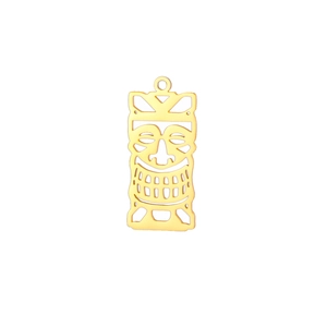 Detailed view of hollow gold-plated titanium steel Tiki mask pendant with intricate carving