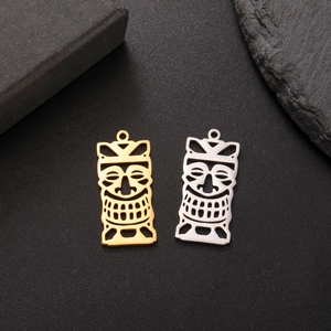 Polished titanium steel hollow Tiki mask pendants in gold and silver plating