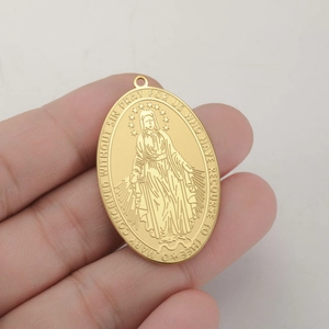 Golden oval Virgin Mary pendant in stainless steel with religious inscription for jewelry