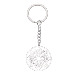 Polished stainless steel octagonal keychain with intricate hollow mandala flower pattern