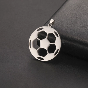 Polished hollow soccer ball pendant made of stainless steel on black leather backdrop