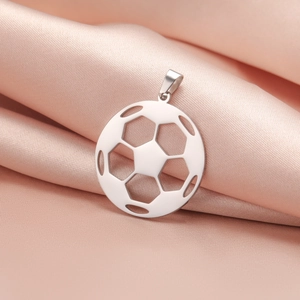 Hollow stainless steel soccer ball pendant in silver finish on soft pink silk background