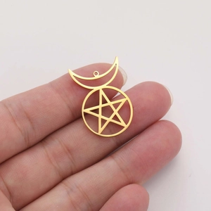 Detailed close-up of 18K gold-plated stainless steel star and crescent moon pendant charm