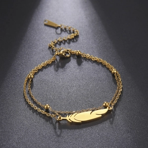 Elegante tobillera de doble capa en acero inoxidable chapado en oro 18K con dije de pluma