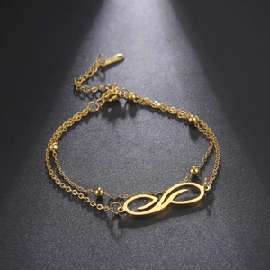 Tobillera de doble capa en acero inoxidable oro 18K con símbolo de infinito y cuentas