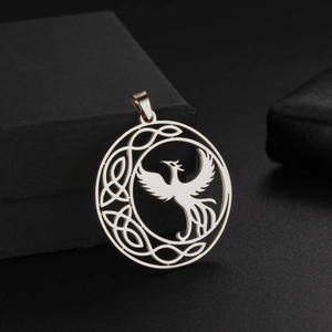 Vintage stainless steel phoenix pendant featuring Celtic knot details on a dark background