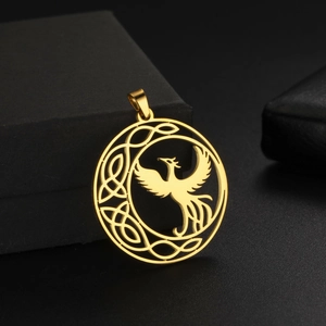 Golden phoenix pendant with Celtic knot design shown next to a premium jewelry box