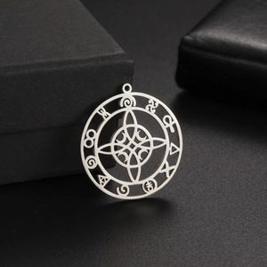 Vintage stainless steel Celtic knot pendant with occult symbols on black jewelry box