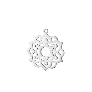 Macro detail of silver stainless steel mandala flower pendant with intricate cutouts