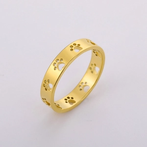 Macro shot of 18K gold plated stainless steel ring with hollowed cat paw patterns