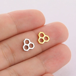 Minimalist gold and silver honeycomb geometric pendant set in stainless steel