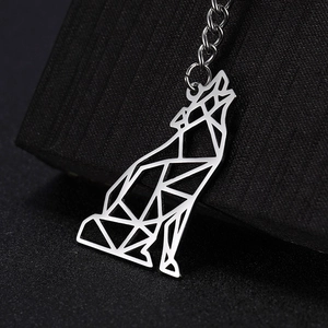 Modern hollow geometric wolf keychain made of polished silver stainless steel metal