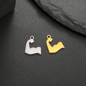 Polished silver and gold strong arm muscle pendants for fitness jewelry makers