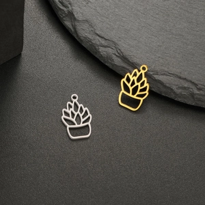 18K gold and silver succulent plant pendants on dark stone background for DIY jewelry