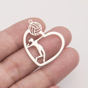 Close-up of stainless steel heart pendant featuring a volleyball player silhouette