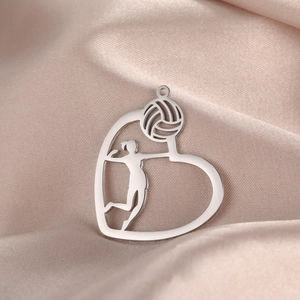 Polished stainless steel heart pendant featuring a volleyball player silhouette design