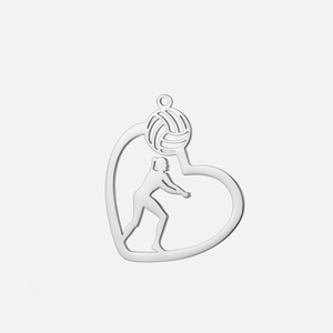 Macro view of silver volleyball player heart pendant with cutout detail and ring bail