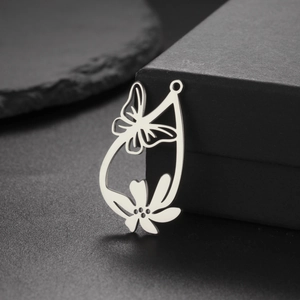 Hollow teardrop pendant with butterfly and flower patterns in silver stainless steel
