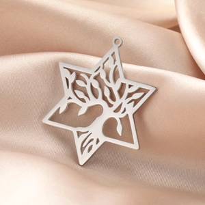 Titanium steel hexagram Tree of Life pendant displayed on silk fabric backdrop